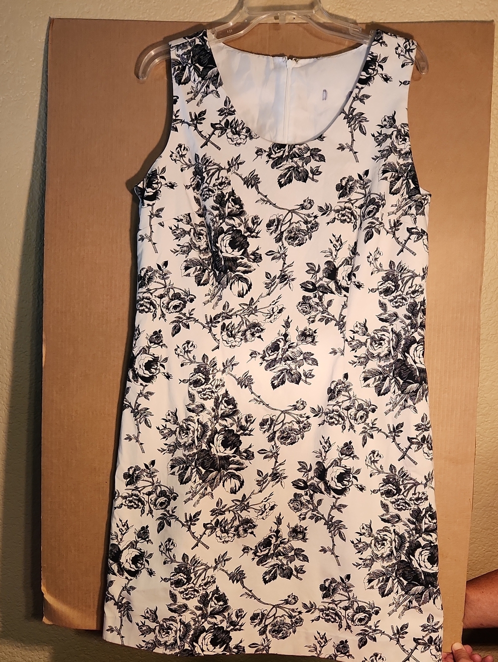 Sleeveless White Mini Dress with Black Floral Print